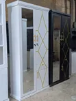 Modern Two-Door Wardrobe with Gold Accents - 1