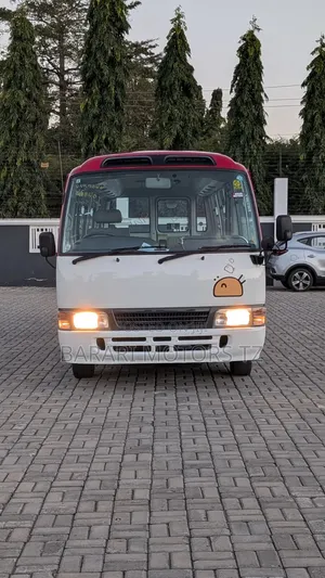 Toyota Coaster 2007 - Red School Bus