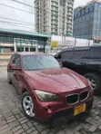 BMW X1 2010 Maroon - 1