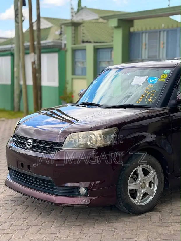 Toyota Corolla Rumion 2009 Maroon - 1