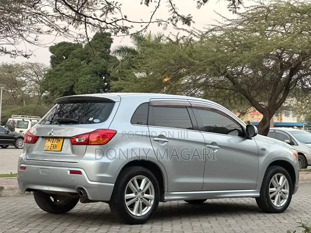Mitsubishi RVR 2010 Silver - 1