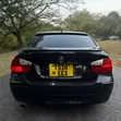 BMW 3 Series 2009 Nyeusi - 5