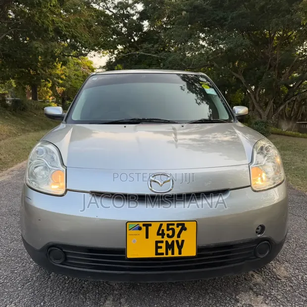 Mazda Verisa 2010 Beige - 1