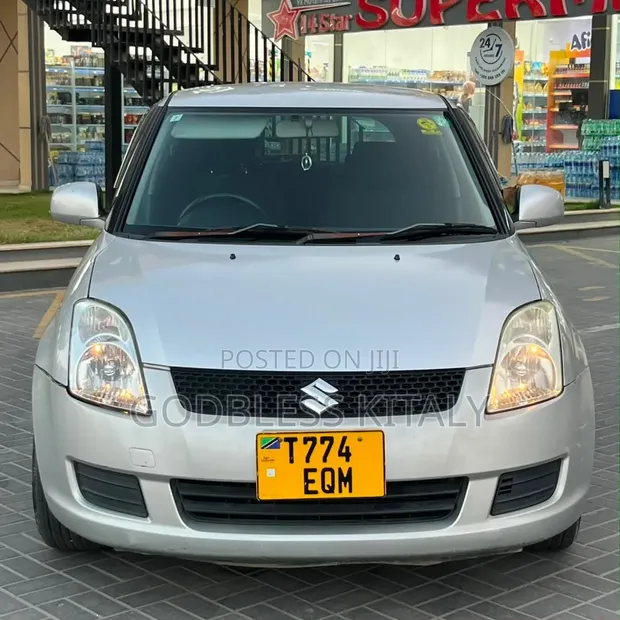 Suzuki Swift 2009 Silver - 1