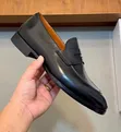 Men's Clarks Classic Leather Penny Loafers - 4
