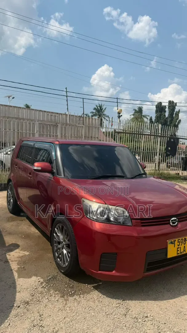 Toyota Corolla Rumion 2009 Maroon - 1