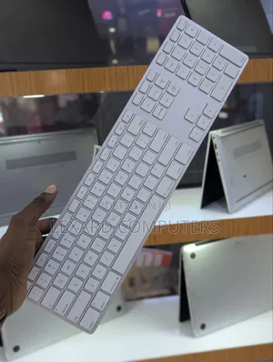 Used Wired MacBook Keyboard - White