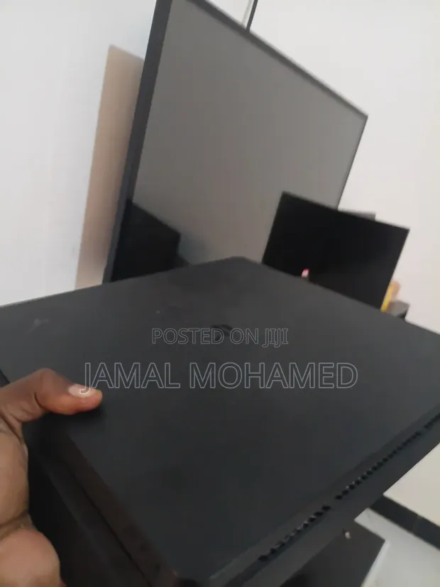 32-Inch TV & PlayStation 4 Slim with 5 Games - 1