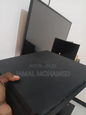 32-Inch TV & PlayStation 4 Slim with 5 Games