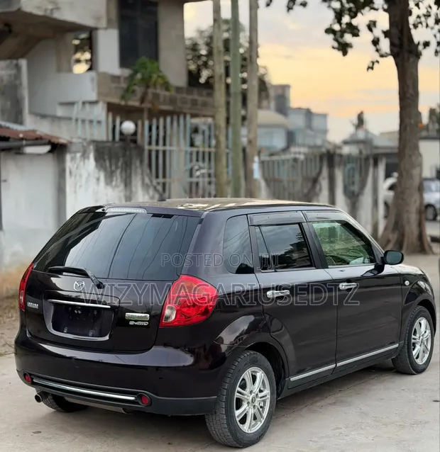 Mazda Verisa 2008 Brown - 1