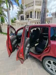 Toyota Ractis 2006 Maroon - 5
