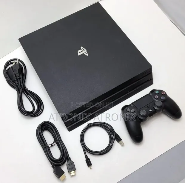 Sony PlayStation 4 Slim 500GB with 2 Controllers & 6 Games - 1