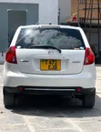 Mazda Verisa 2010 - 4