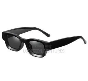 Christian Louboutin Dark Narrow Frame Sunglasses