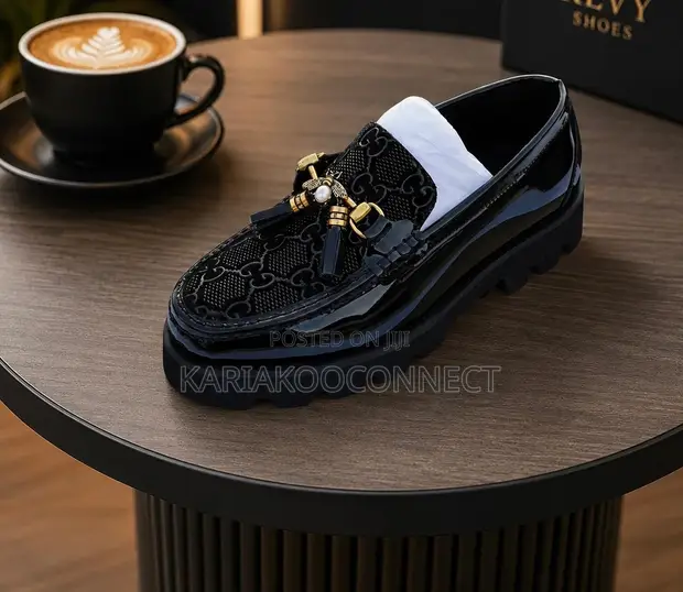 Men's Gucci Black Patent Tasseled Loafers - 1