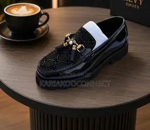 Men's Gucci Black Patent Tasseled Loafers