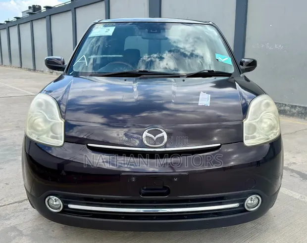 Mazda Verisa 2009 Maroon - 1