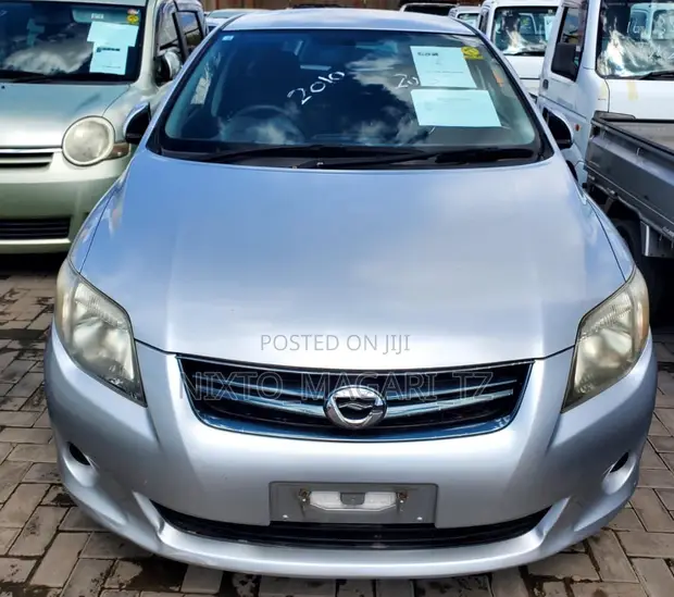 Toyota Corolla Fielder 2010 Nyeupe - 1
