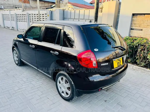Mazda Verisa 2010 Maroon - 1