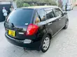 Mazda Verisa 2010 Maroon - 3