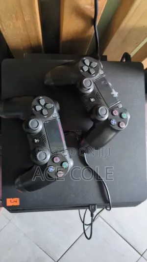 Used Sony PlayStation 4 (PS4) with 2 Controllers