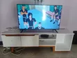 Used White TV Stand with Storage - 1
