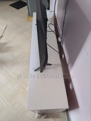 Used White TV Stand with Storage