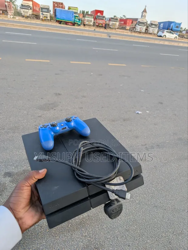 PS4 Slim Console with Games, 2 Controllers - 1