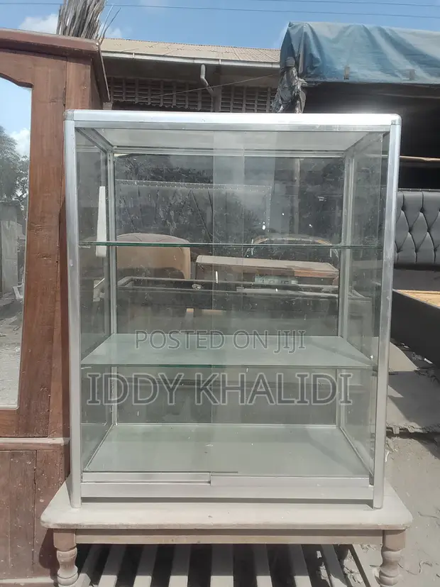 Brand New 4-Tier Glass Showcase Cabinet - 1