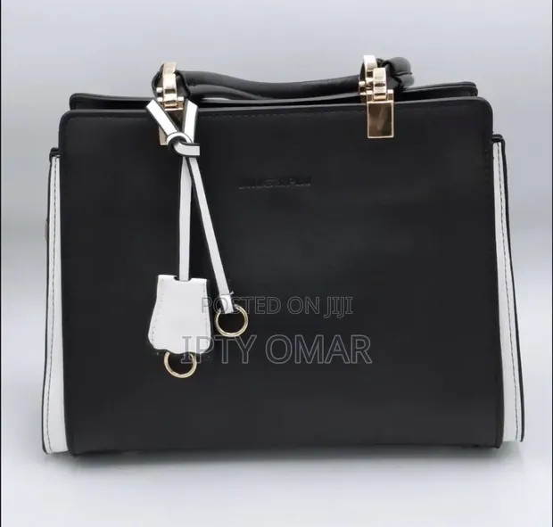 Black and White Handbag with Gold Accents - 1