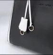 Black and White Handbag with Gold Accents - 2