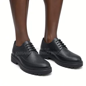 Christian Louboutin Perforated Derby Shoes