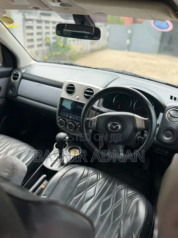 Mazda Verisa 2010 Maroon - 1