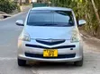 Toyota Ractis 2006 Nyeupe - 1