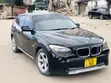 BMW X1 2011 Nyeusi - 1