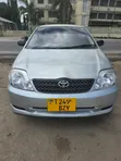 Toyota Corolla 2004 Nyeupe - 1