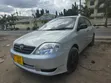Toyota Corolla 2004 Nyeupe - 3