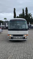 Toyota Coaster 2007 Nyeupe - 1