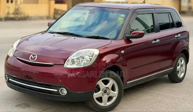 Mazda Verisa 2012 Maroon - 1