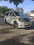 Toyota Alphard 2011 - Pearl White - 1