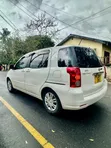 Toyota Raum 1.5 AWD 2007 White - 2