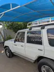 Toyota Land Cruiser LX 2014 Nyeupe - 2