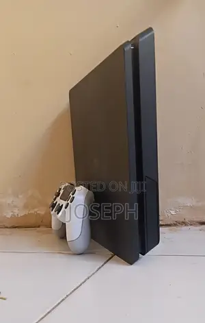 Sony PlayStation 4 Slim (Black) with DualShock Controller