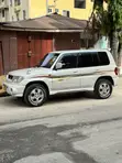 Mitsubishi Pajero IO 1999 White - 1