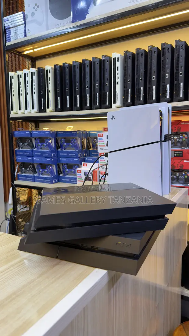 PS4 Fat UK Console - 6 Games, 2 Controllers - 1