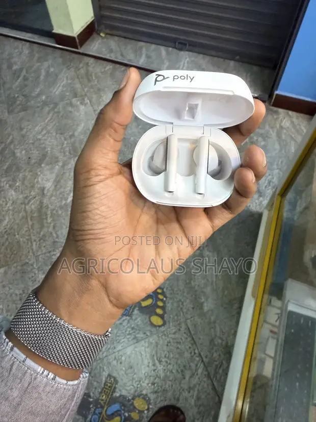 Poly Voyager Free 60+ UC Touchscreen Smart Case Earbuds - 1