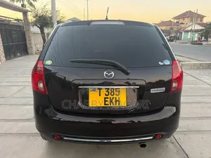 Mazda Verisa 2010 Rangi ya Maroon