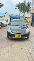 Mazda Verisa 2009 Maroon - 1