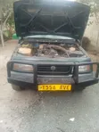 Suzuki Escudo 1998 Nyeusi - 4