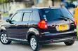 Mazda Verisa 2010 Burgundy - 1